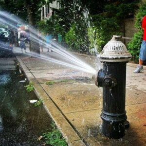 New york fire department says 'call us' if you want to cool off with city hydrant - photo licensed by shore news network.