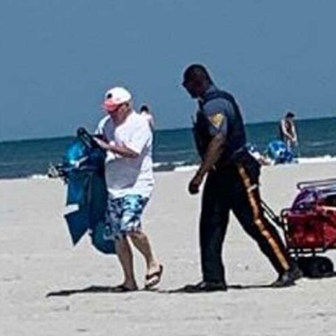 Avalon cop steps up and helps grandparents in need at the beach - photo licensed by shore news network.