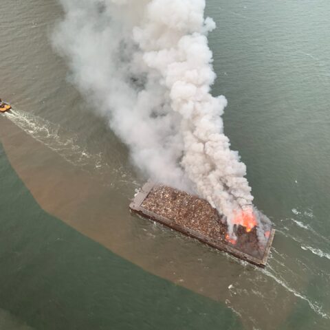 Delaware nrec monitoring after garbage barge fire in delaware bay - photo licensed by shore news network.