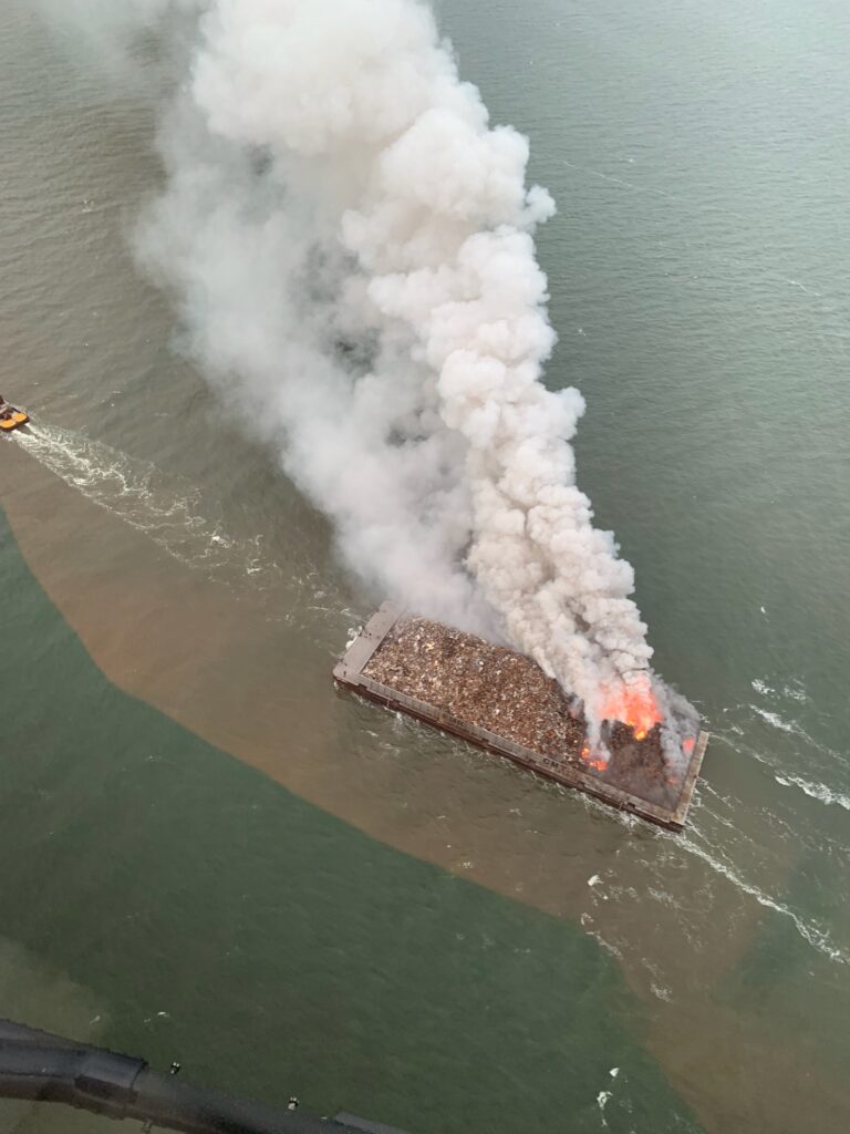 Delaware nrec monitoring after garbage barge fire in delaware bay - photo licensed by shore news network.