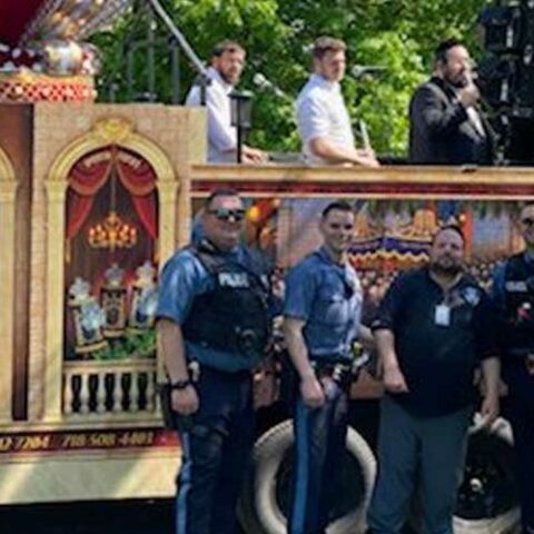 Jackson police assist in sefer torah parade - photo licensed by shore news network.