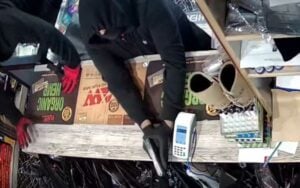 Armed robbers zip-tie cashier's hands inside queens store
