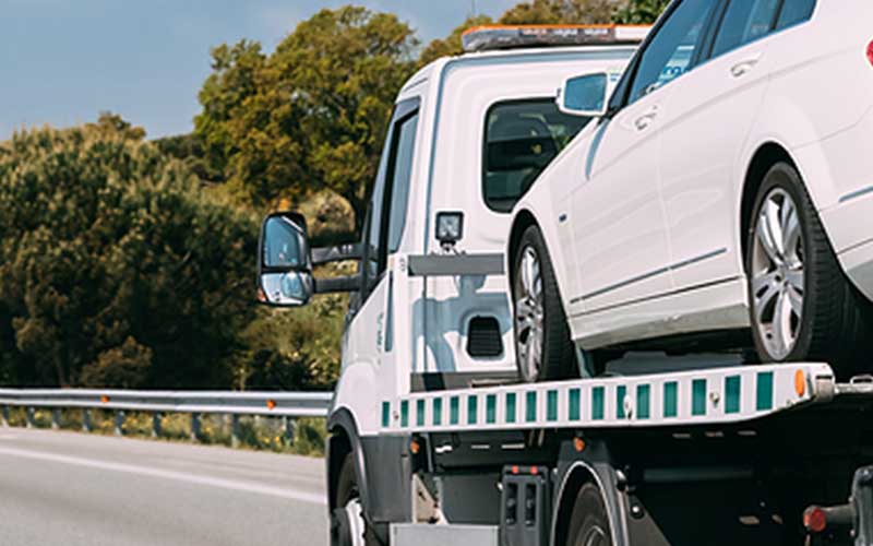 Maryland Police Officer Rescues Tow Truck Driver Pinned by Car