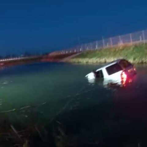 Footage of daring police rescue of driver from car in pond released by police - photo licensed by shore news network.