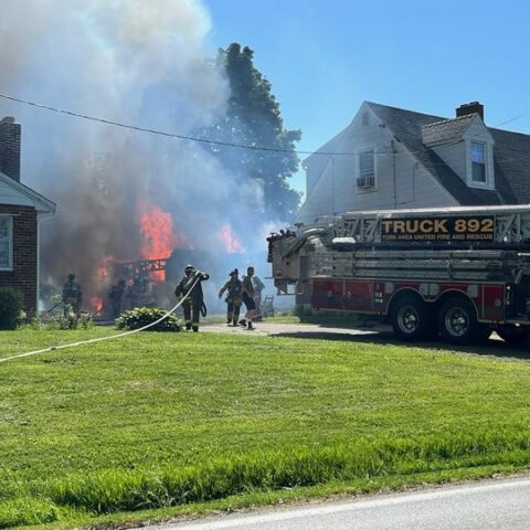 Firefighters respond to garage fire in dover - photo licensed by shore news network.