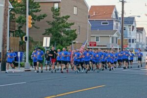 Toms river police officers participate in annual special olympics torch run