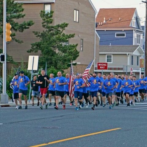 Toms river police officers participate in annual special olympics torch run - photo licensed by shore news network.