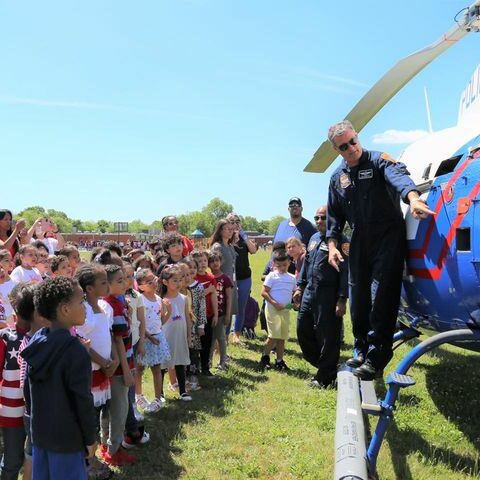 Bay shore students greet police with cheers - photo licensed by shore news network.