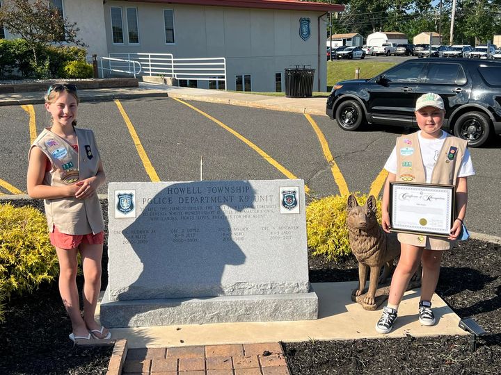 Howell Girl Scouts Donate Cookie Sale Money to Police K-9 Unit Who then Pay it Forward