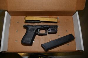 Syracuse police foot chase ends with gun charge
