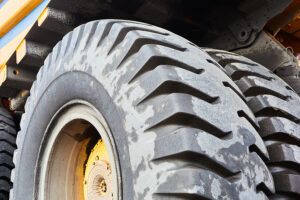 Female road worker in critical condition after being struck by dump truck at work site