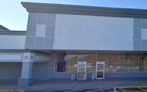 Sign removed from corrado's brick store