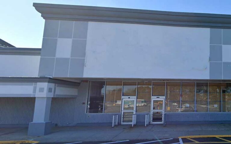 Sign removed from corrado's brick store - photo licensed by shore news network.