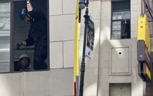 New york city police stop suicide building jumper in greenwich village