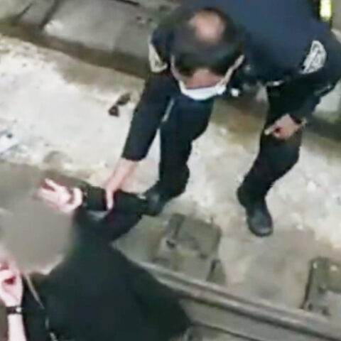 Watch: new york city cop jumps onto subway tracks to rescue woman who fell during medical episode - photo licensed by shore news network.
