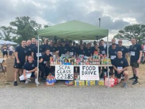Suffolk county police recruits participate in bay shore fire company 5k and food drive