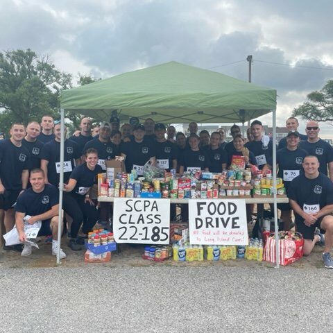 Suffolk county police recruits participate in bay shore fire company 5k and food drive - photo licensed by shore news network.
