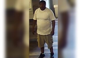 Police searching for man who forced his entry into travel agency, robbed it