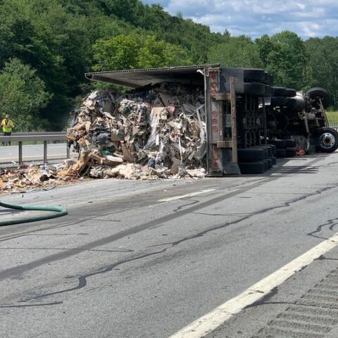 Trash trailer roll over on route 17 in sullivan county - photo licensed by shore news network.