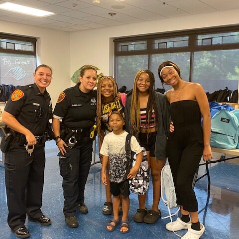 Officers visit bellport boys and girls club ahead of new school year - photo licensed by shore news network.