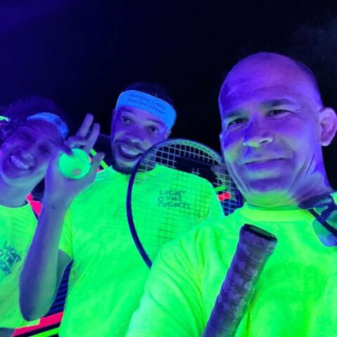 Evesham police officers team up for glow tennis and basketball with local kids - photo licensed by shore news network.