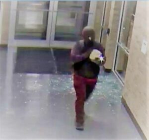 New york police searching for suspect who broke into school