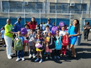 Look at these smiling faces as newark police team up with community for back-to-school drive