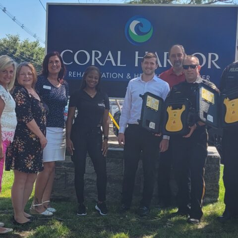 Coral harbor rehab donates defibrillators to neptune city police department - photo licensed by shore news network.