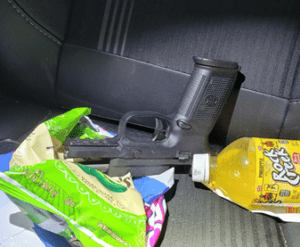 D. C. Suspect robs victim at gunpoint and shoots at passing vehicle