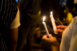 12-year-old struck in face by gunfire during candlelight vigil in utica
