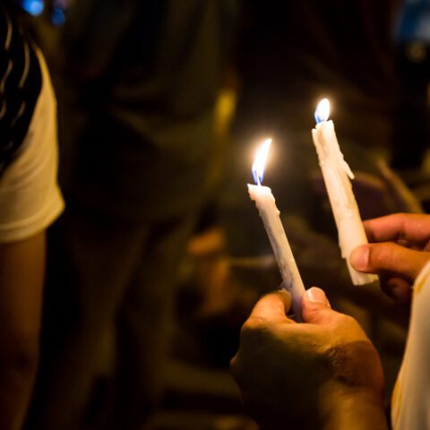 12-year-old struck in face by gunfire during candlelight vigil in utica - photo licensed by shore news network.