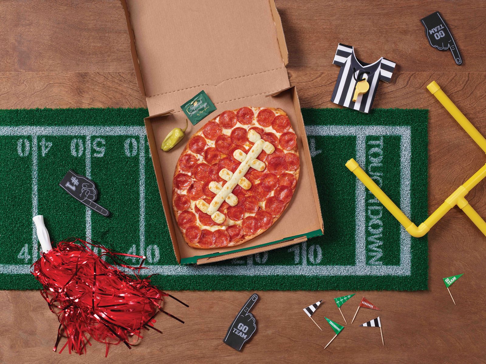 Everybody Wins This Season With Papa Johns Football Pizza