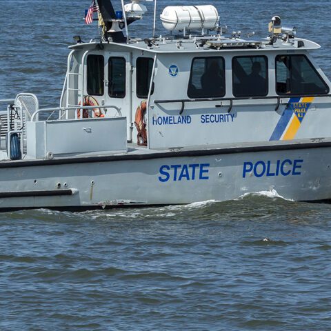 Mother, child rescued from capsized boat surviving in air bubble as vessel submerged - photo licensed by shore news network.