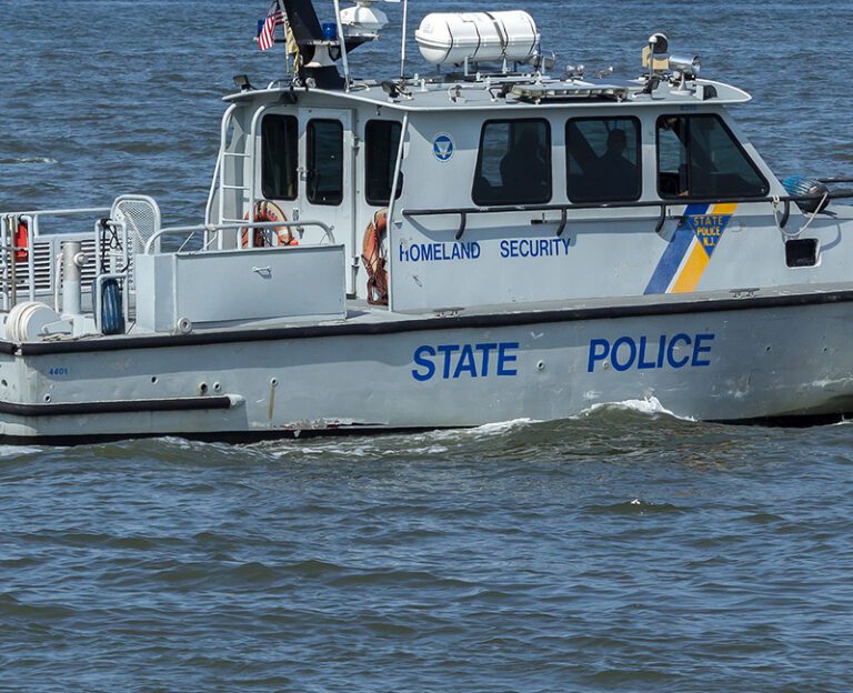 Mother, child rescued from capsized boat surviving in air bubble as vessel submerged - photo licensed by shore news network.