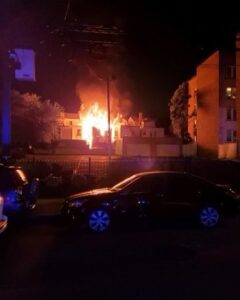 Twelve people displaced after fire at abandonded house spreads