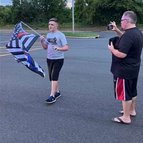 Boy visits new jersey on national tour to honor fallen officers - photo licensed by shore news network.