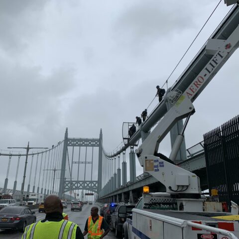 Man rescued from atop new york city bridge - photo licensed by shore news network.