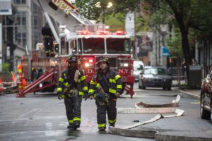 Six injured in nyc fire that forced people to jump from building to safety