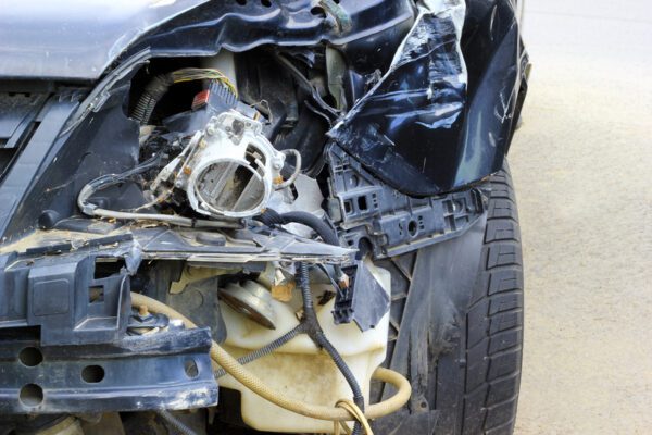 Man Charged with DWI After Crashing Pickup Truck into Parked Car