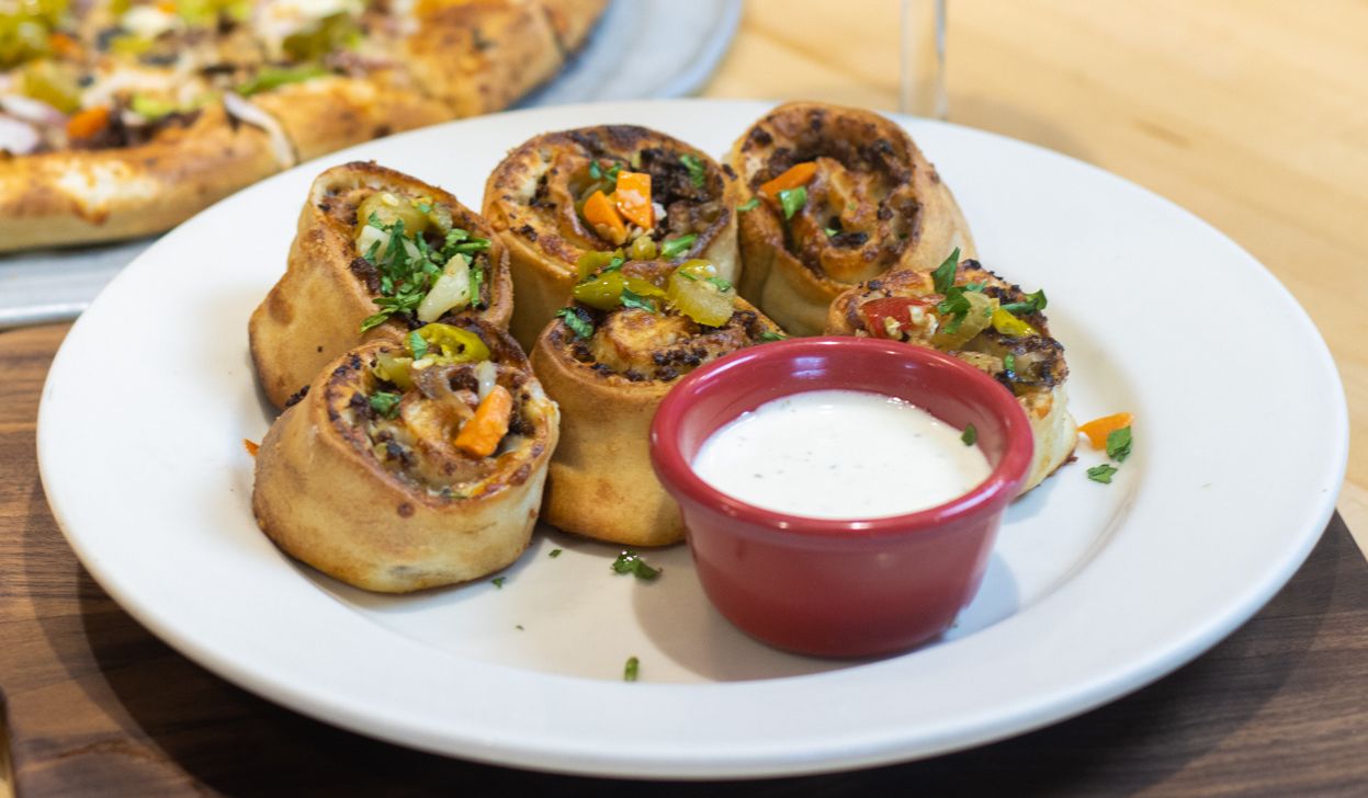 Old Chicago Pizza + Taproom Unveils Chicago Cheesesteak Rolls