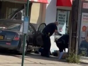 Suspect fleeing from police carjacked vehicle, crashed into kfc