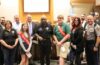 The winners of the veterans day essay contest were also present to accept their awards.