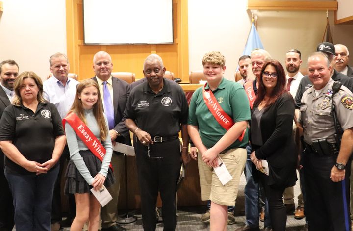 The winners of the Veterans Day Essay Contest were also present to accept their awards.