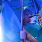 Man plays saxophone while undergoing brain surgery. Photo by Paideia Hospital