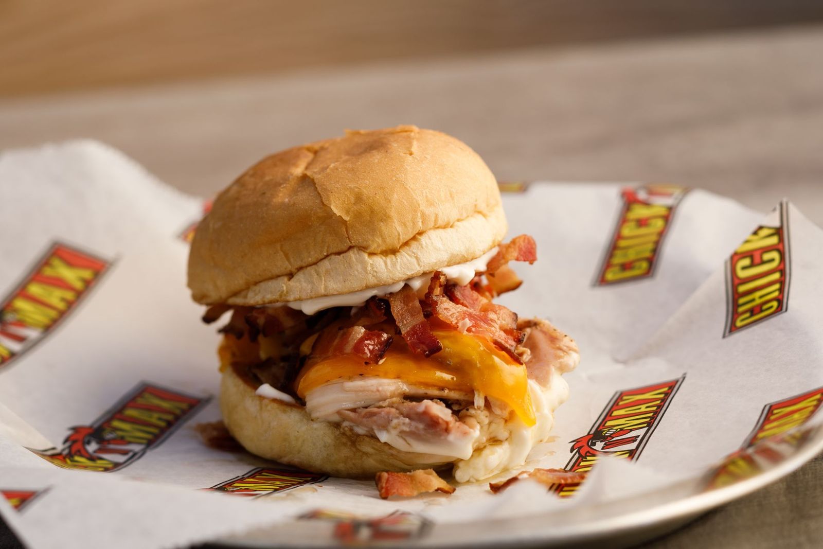 Chick N Max Maple Bacon Chicken Sandwich Chick N Max Rolls Out Two New Sandwiches on Heels of Its Franchise Expansion Announcement