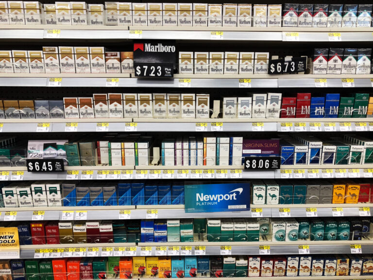 Cigarettes on display for sale in local drug store for purchase for customers.