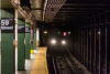 A train approaching the platform at columbus circle subway station in manhattan, new york city - photo by jon bilous,