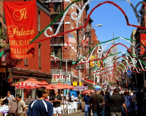 People stroll along Mulberry Street in the heart of New York City s famed Little Italy district during the annual San Gennaro street festival. © Lei Xu