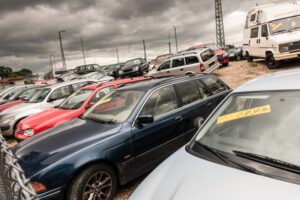 19 charged in tri-state car dealership title washing ring