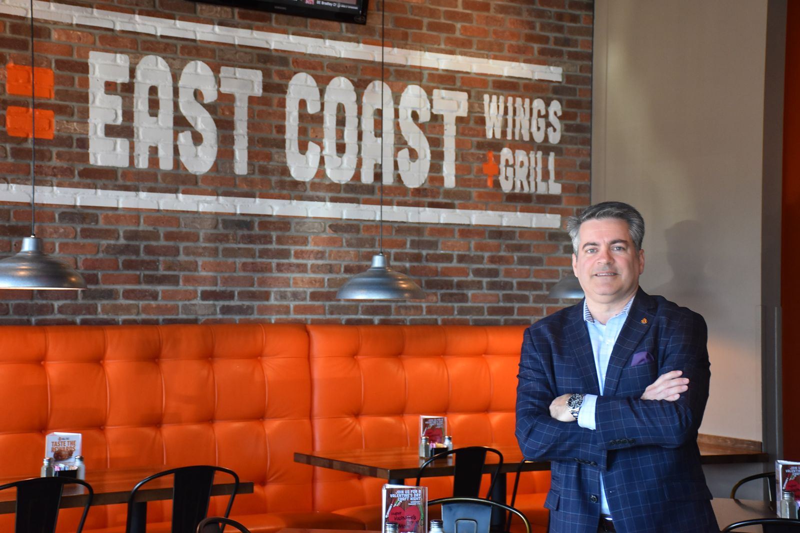 Sam Ballas, CEO and president of East Coast Wings + Grill